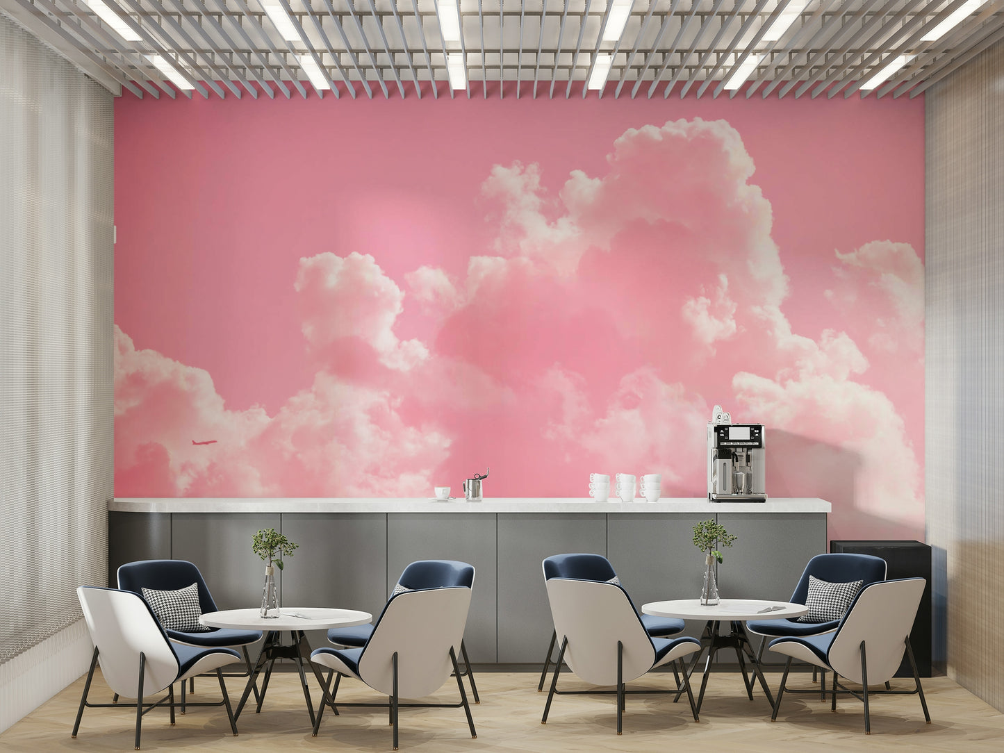 An artistic pink cloudscape mural on minimalist wallpaper.

