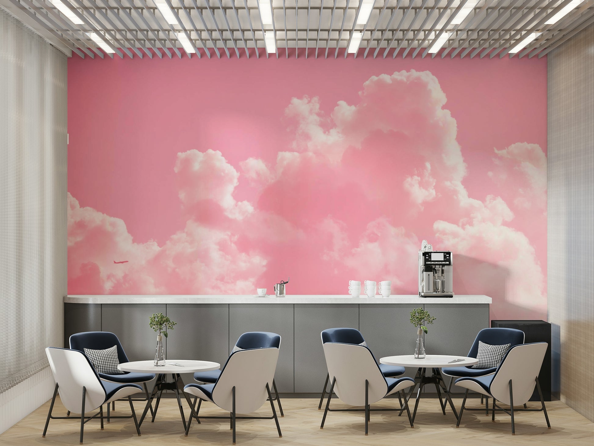 An artistic pink cloudscape mural on minimalist wallpaper.

