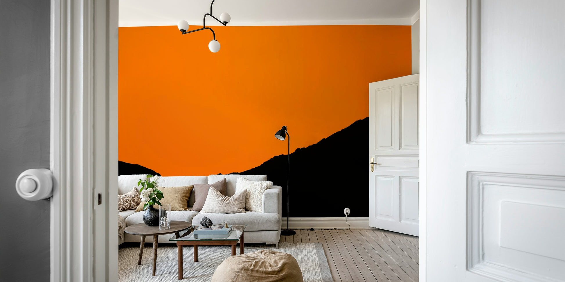 A beautiful desert mountain wallpaper mural with a vivid sunset.

