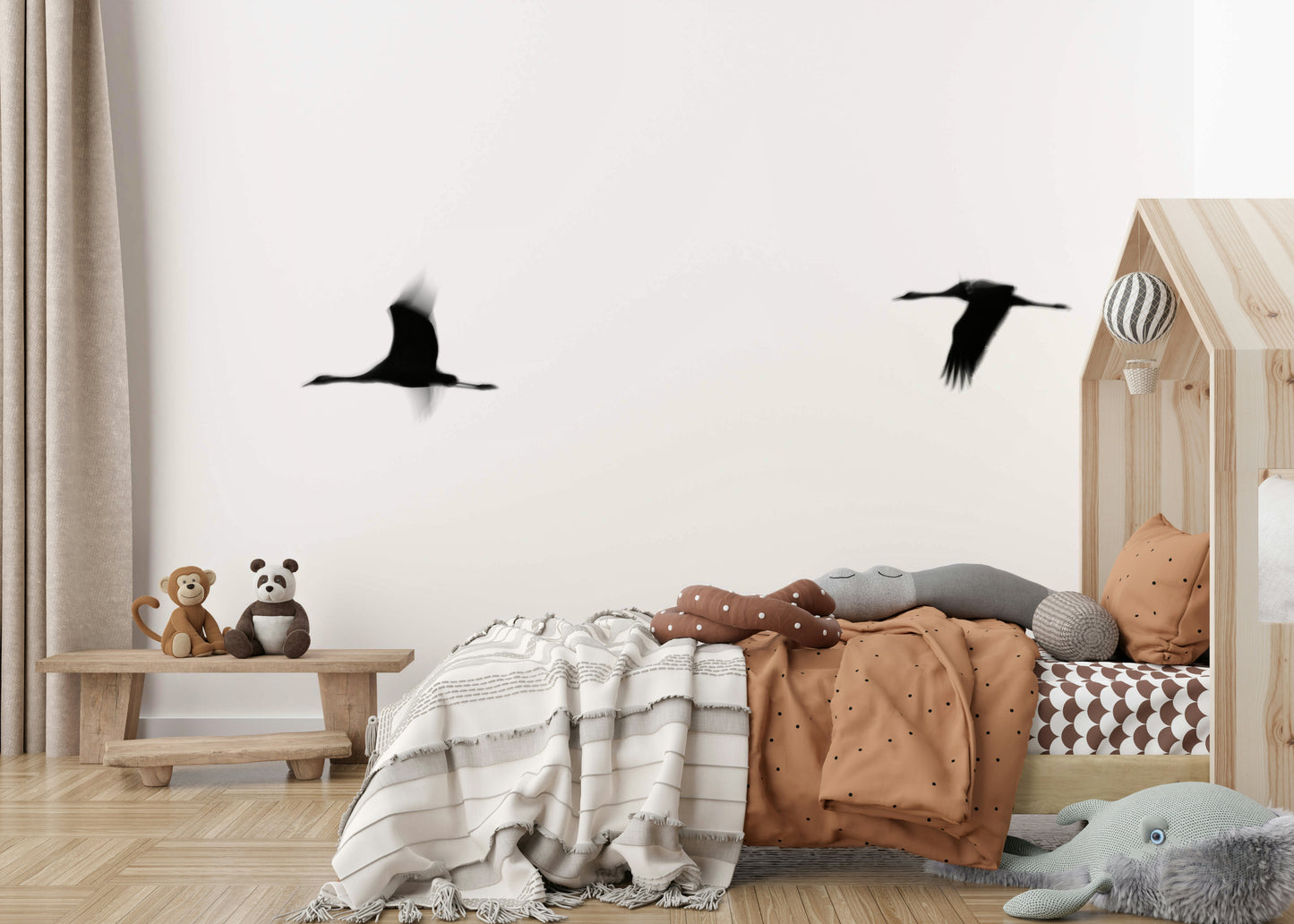 A graceful subtle bird wall mural in cool, natural tones.

