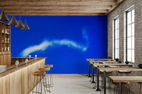 A peaceful open sky mural on decorative wallpaper.

