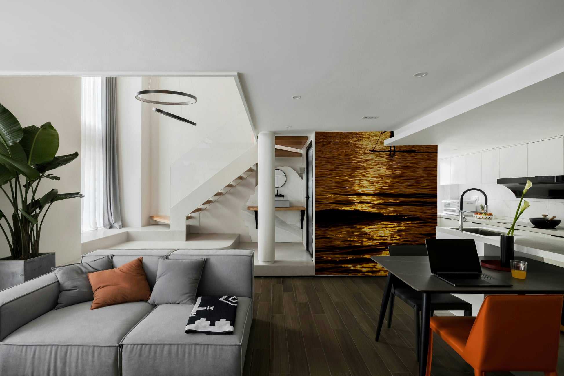 A beautiful wide-angle wall mural of the sea at dusk.

