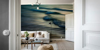 An artistic coastal scene mural on minimalist wallpaper.

