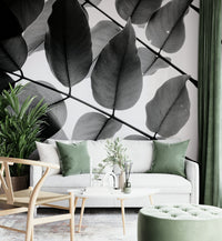 A graceful subtle leaf wall mural in cool, natural tones.


