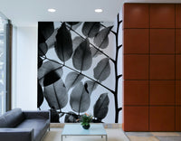 A beautiful modern art wall mural of tree leaves.

