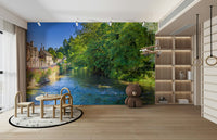 A beautiful charming village wallpaper mural with a stream.

