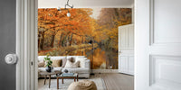 An artistic autumn scene mural on minimalist wallpaper.

