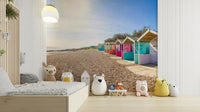 A serene beach hut scene wall mural for your decor.

