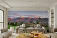 A beautiful wide-angle wall mural of a mountain sunrise.


