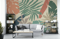 An artistic jungle leaf mural on minimalist wallpaper.

