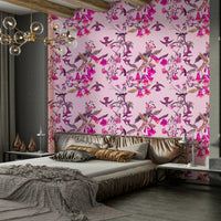 A peaceful botanical aviary mural on decorative wallpaper.

