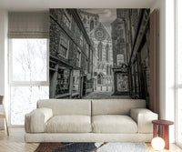 A graceful subtle shadow wall mural in cool, dark tones.

