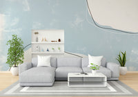 A beautiful powder blue wallpaper mural with artistic strokes.

