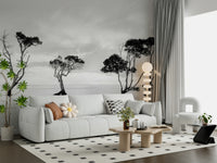 A graceful subtle tree pattern wall mural in cool, white tones.

