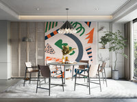 An artistic abstract shape mural on minimalist wallpaper.

