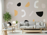 An artistic abstract shape mural on elegant wallpaper.