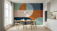 An artistic abstract shape mural on elegant wallpaper.