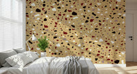 An artistic contemporary speckled mural on minimalist wallpaper.