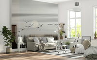 Decorative wall mural showcasing birds in flight under a luminous lunar backdrop.