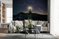 Decorative wall mural showcasing a radiant beacon illuminating a cosmic, celestial landscape.