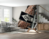 Wall mural depicting lively Brooklyn streets with classic city textures and signs.