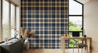 Tartan check wallpaper in navy hues for a cozy, sophisticated wall design.