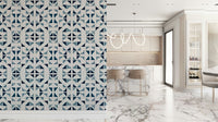 Abstract triangle pattern wallpaper in cool blue hues for a contemporary interior look.