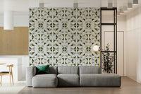 Geometric wallpaper with layered triangles in gentle olive hues for modern home decor.
