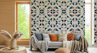 Geometric winter wall mural featuring abstract triangle shapes in cool blue and gray tones.