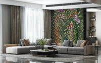 Garden-inspired wallpaper with bird-of-paradise plants and dense tropical leaves.