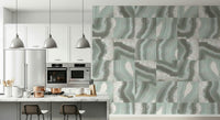 Marble-inspired wallpaper with soft mint hues and elegant agate-inspired swirls.