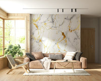 Luxurious marble wallpaper with gilded swirls and dynamic flowing patterns.