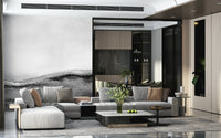 Decorative mural featuring a subtle monochrome landscape with mountains and sky.