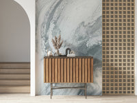 Decorative silver swirl wallpaper mural adding shimmer, depth, and movement to living spaces.