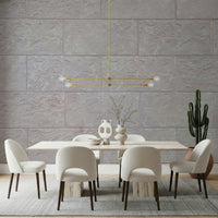 Neutral-toned stone block mural with layered textures creating a calm and stylish ambiance.