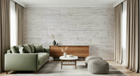 Light-colored stacked stone wall wallpaper mural adding texture, warmth, and modern rustic charm.