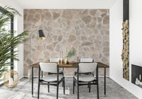 Wall mural with intricate stone mosaic patterns for a sophisticated and organic décor element.