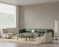 Textured wall mural in soft beige with subtle plaster details