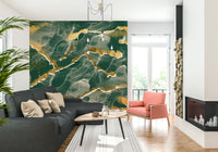 Detailed view of an emerald and gold abstract Marble Wallpaper, showing the luxe, swirling mineral pattern.
