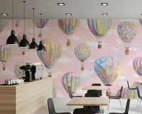 Dreamy Balloon Voyage wall mural with soft clouds and pastel tones creating a serene atmosphere.