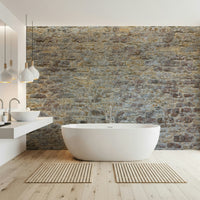 Aged Weathered Stone Brick wall mural, textured stone appeal.