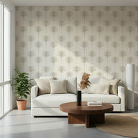A tropical-inspired wallpaper with delicate palm silhouettes creating a calm, neutral look.