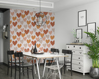A playful wallpaper with terracotta and beige hearts arranged in a charming repeating design.