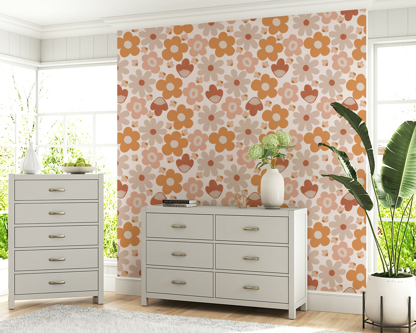 A warm earthy wallpaper featuring simple boho floral shapes in peach, tan, and clay tones.