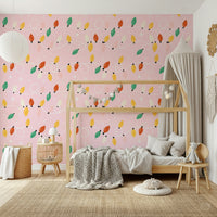 A charming wallpaper covered in looping string lights and delicate white stars on pale pink.