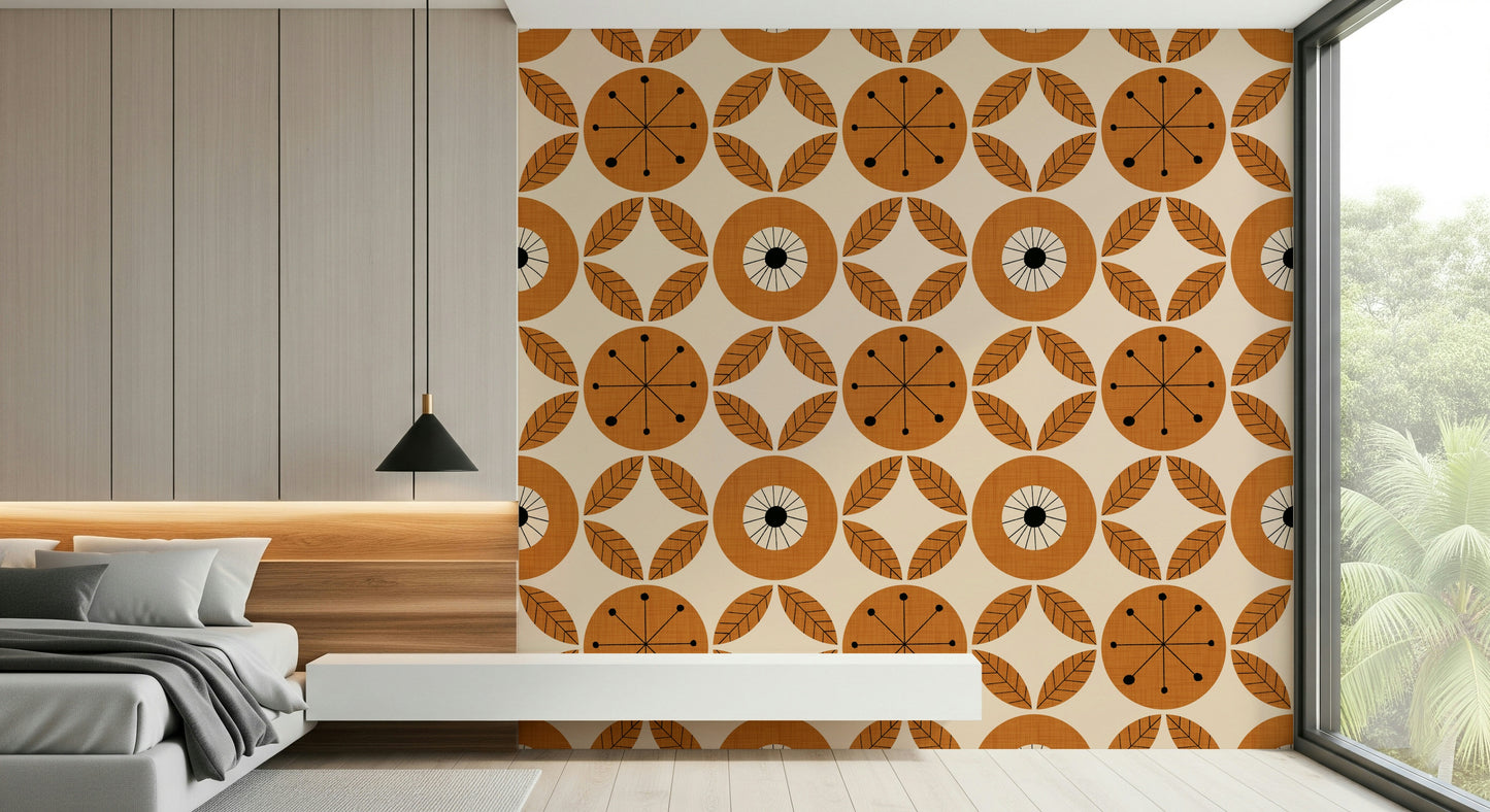 A nostalgic mid-century modern wallpaper with repeating orange wheels and leaf clusters.