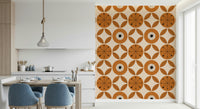 Retro charm wallpaper with repeating orange circular graphics and neatly arranged leaf shapes.