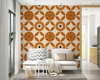 A patterned wallpaper featuring classic mid-century circles and minimalist leaf clusters.