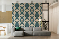 Mid-century modern teal wallpaper with radial geometric circles and repeating leaf patterns.