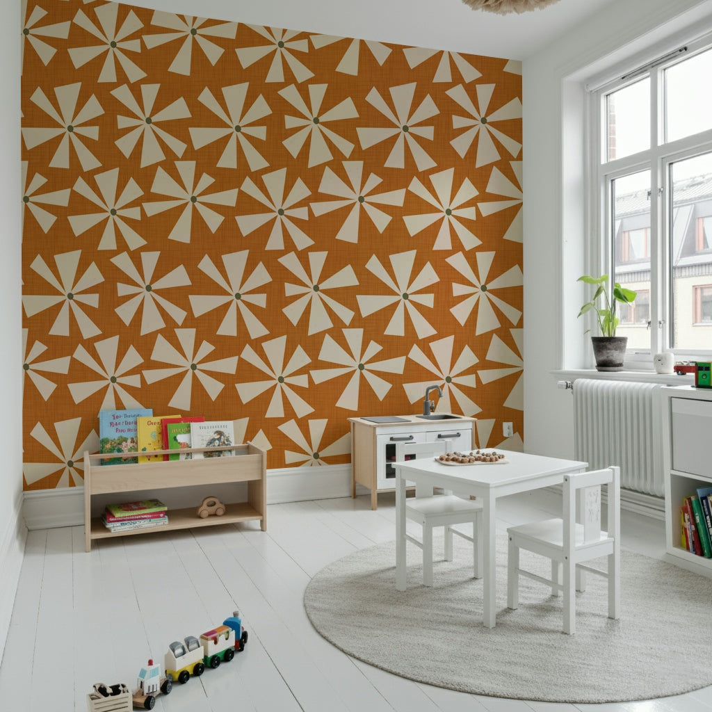 Geometric floral wallpaper with stylized star-like flowers across a warm orange background.